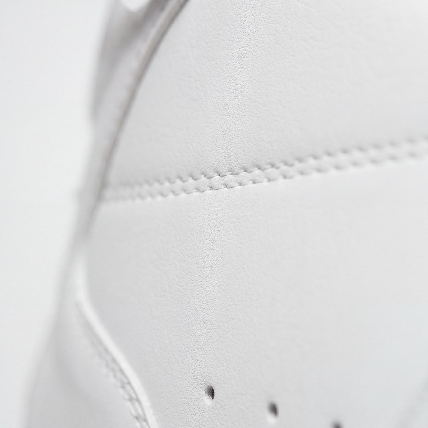 The surface grain of the premium microfibre upper, in close-up.